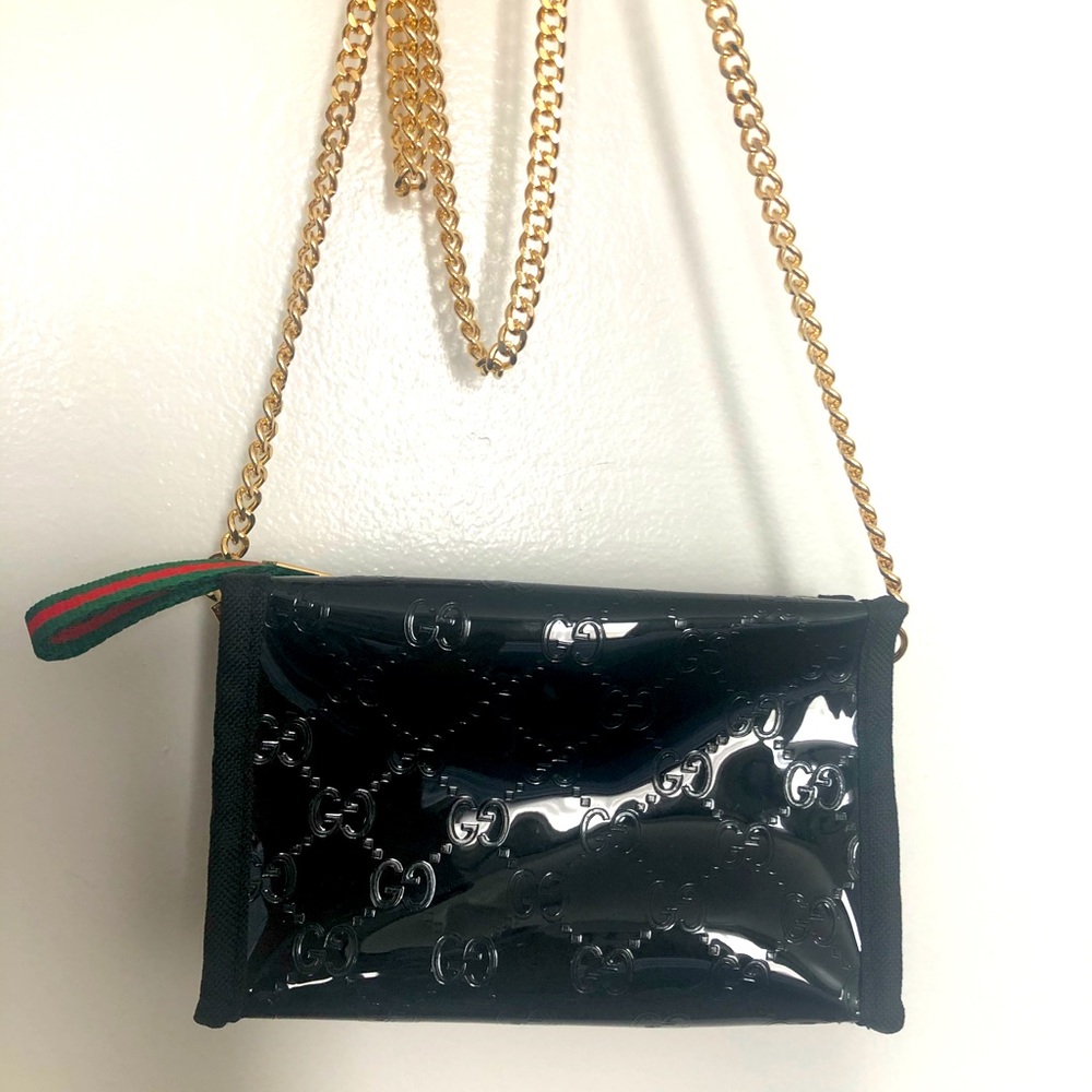 Gucci makeup bag with chain
